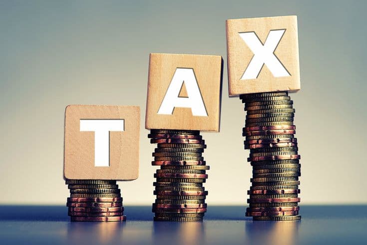 Financial professionals reviewing global compliance documents